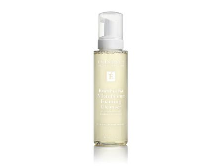 A white bottle of Eminence Kombucha Microbiome Foaming Cleanser on a white background, labeled &ldquo;E&rdquo; and &ldquo;with micellar technology.&rdquo;