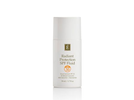 A white bottle of &Eacute; radiant protection SPF fluid, SPF 30 sunscreen with broad-spectrum UV protection, 50 ml.