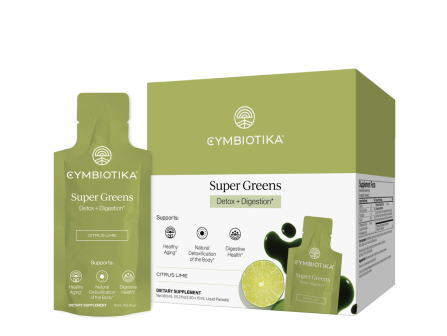 A green Cymbiotika &ldquo;Super Greens&rdquo; detox + digestion supplement box and packets, labeled &ldquo;Citrus Lime.&rdquo;